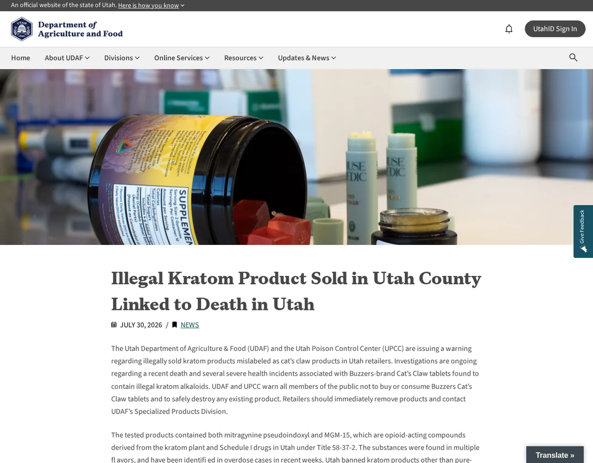 The Utah Department of Agriculture and Food news page dated July 30, 2026, headed Illegal Kratom Product Sold in Utah County Linked to Death in Utah, with the opening paragraphs naming Buzzers-brand Cat’s Claw tablets and the two compounds found.