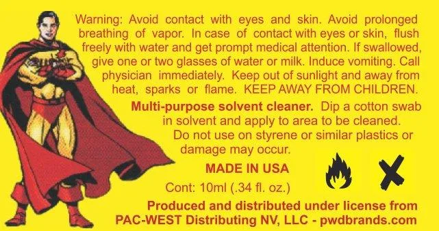 A yellow label with a cartoon superhero in a red cape: warnings to avoid contact with eyes and skin and prolonged breathing of vapour, induce vomiting if swallowed; Multi-purpose solvent cleaner, dip a cotton swab in solvent and apply to area to be cleaned, do not use on styrene; Made in USA; 10 ml; produced and distributed under license from Pac-West Distributing NV, LLC, pwdbrands.com.