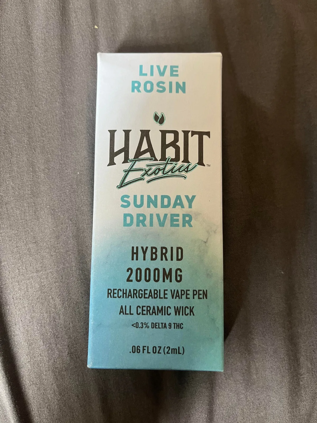 A Habit Exotics Live Rosin Sunday Driver box: Hybrid, 2000MG, rechargeable vape pen, all ceramic wick, under 0.3% delta 9 THC, 2 mL.