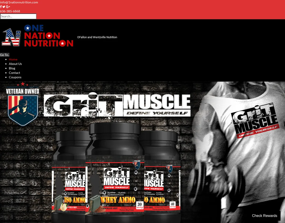 The home page of 1nationnutrition.com in December 2017: a red bar with an email address and the phone number 636-385-6868, the One Nation Nutrition logo in stars and stripes with the line OFallon and Wentzville Nutrition, and a banner for GritMuscle protein tubs with a Veteran Owned badge.