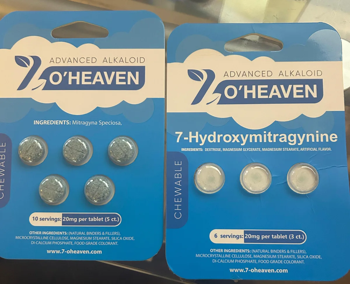 Two blue cards of 7 O'Heaven Advanced Alkaloid chewable tablets side by side: the left card of five tablets lists Ingredients: Mitragyna Speciosa; the right card of three tablets is printed 7-Hydroxymitragynine.