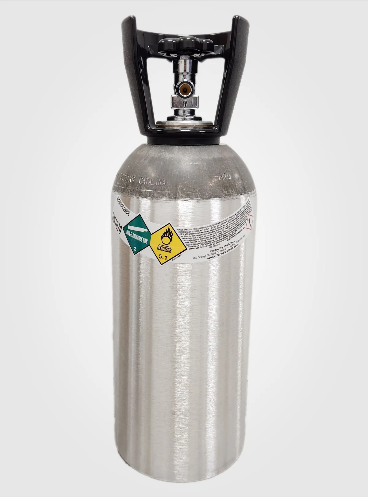 A brushed-aluminum cylinder with a black carry handle, stamped CATALINA and N2O on the shoulder, with a label reading Nitrous Oxide UN1070, Non-Flammable Gas 2, Oxidizer 5.1, a danger warning, and Tanks By Mail, Inc., 150 Orange St., Suite C, Albany, NY 12210.